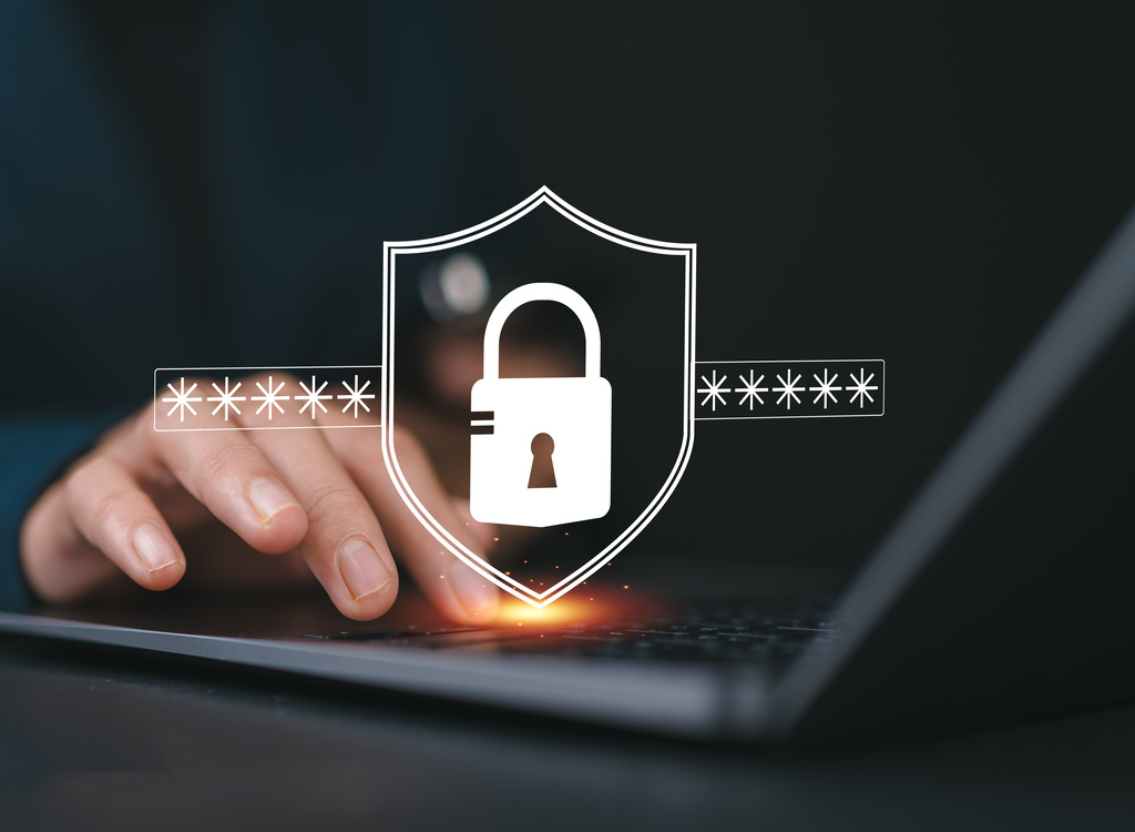 Cyber security concept. Lock icon and password input, Women using laptop with a digital shield icon representing cybersecurity, showcasing online security measures, password protection, data privacy,